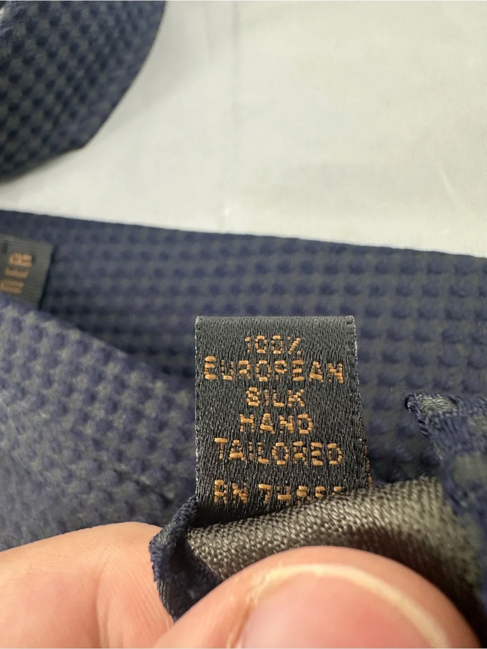 Audrey Buckner green and blue square silk tie